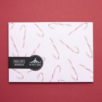 8 enveloppes de Noël "Cannes de sucrerie" rose - C5 3