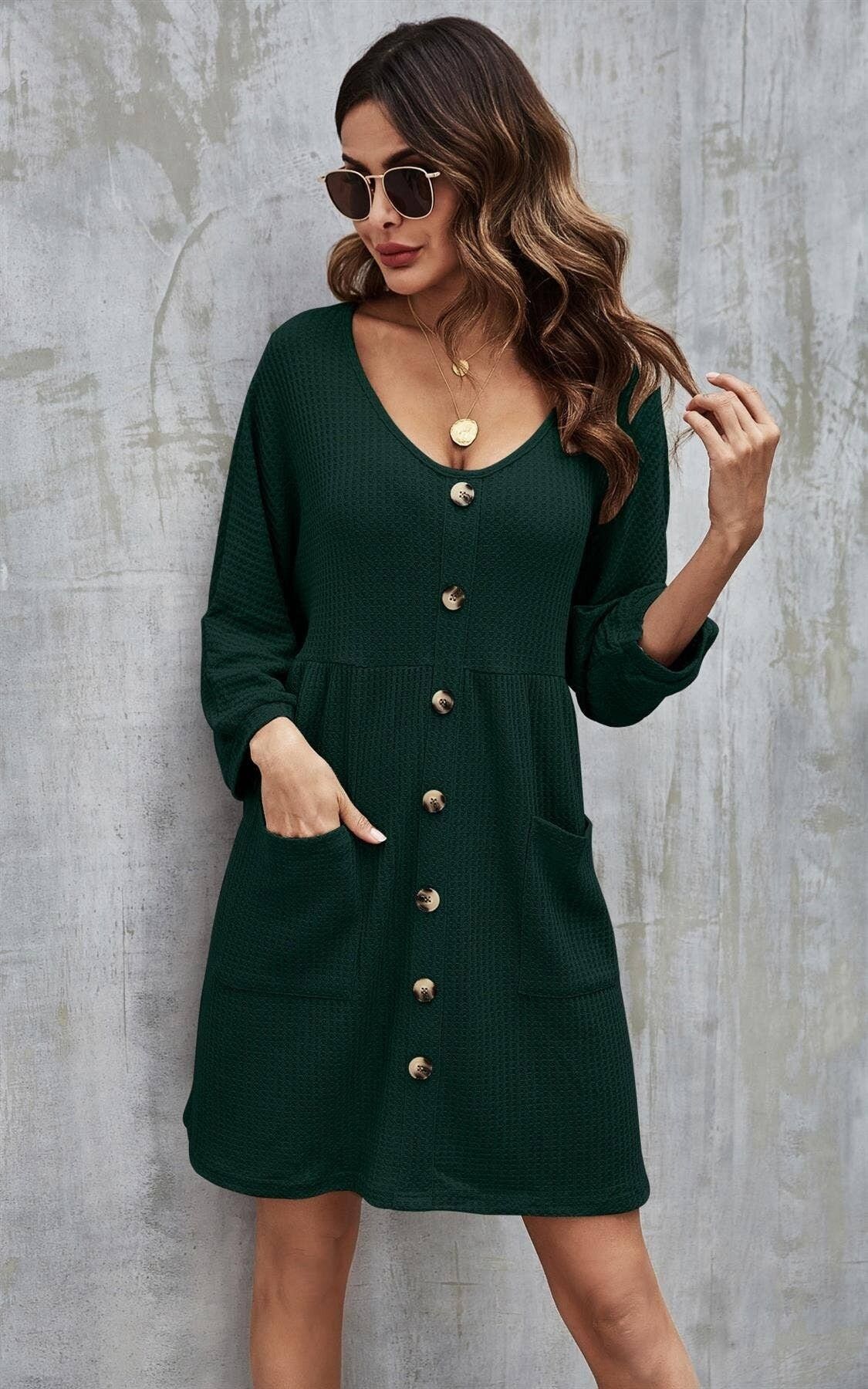 Mini abito con bottoni sul davanti in verde scuro