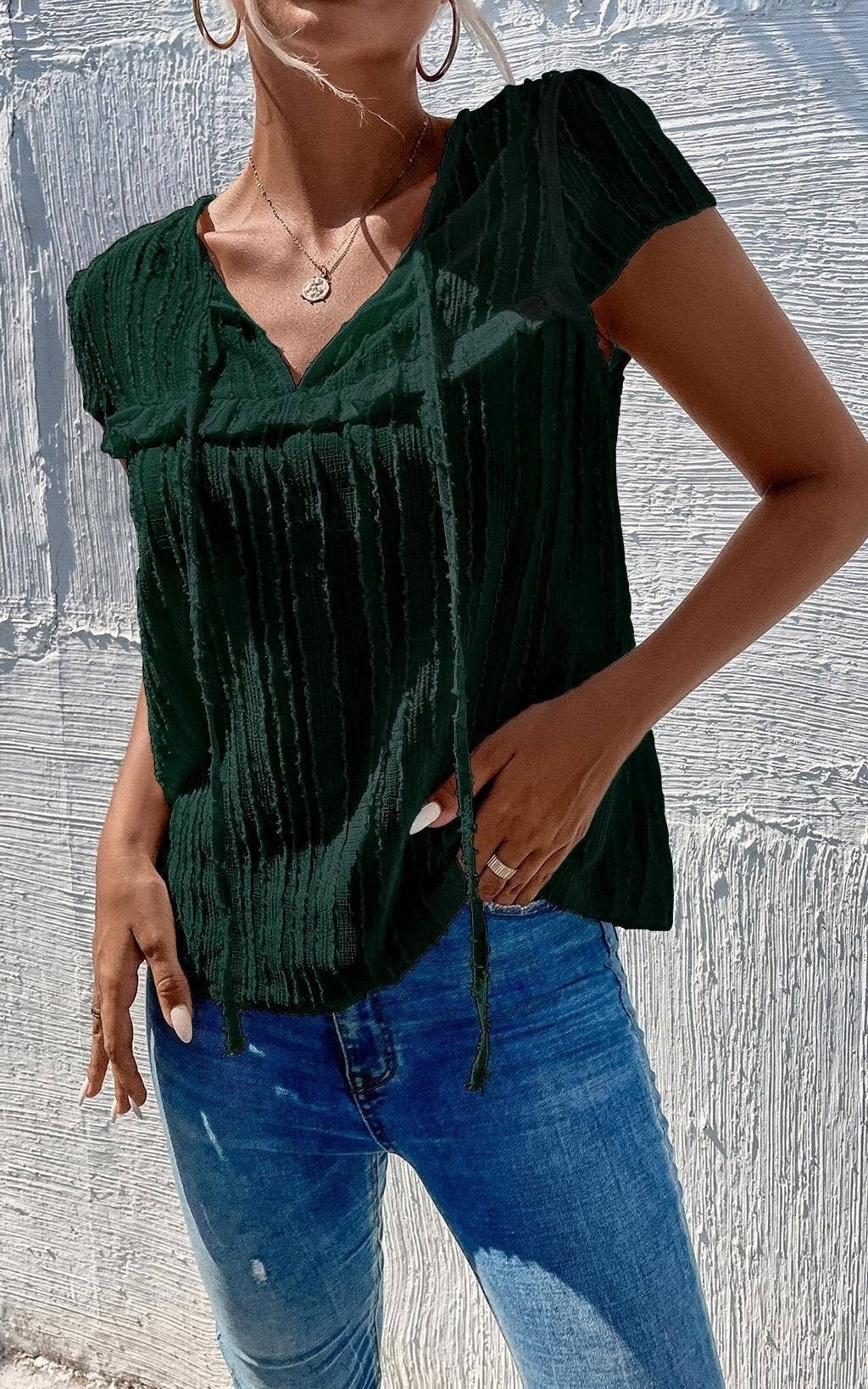 Top velato in tulle floccato a pois verde