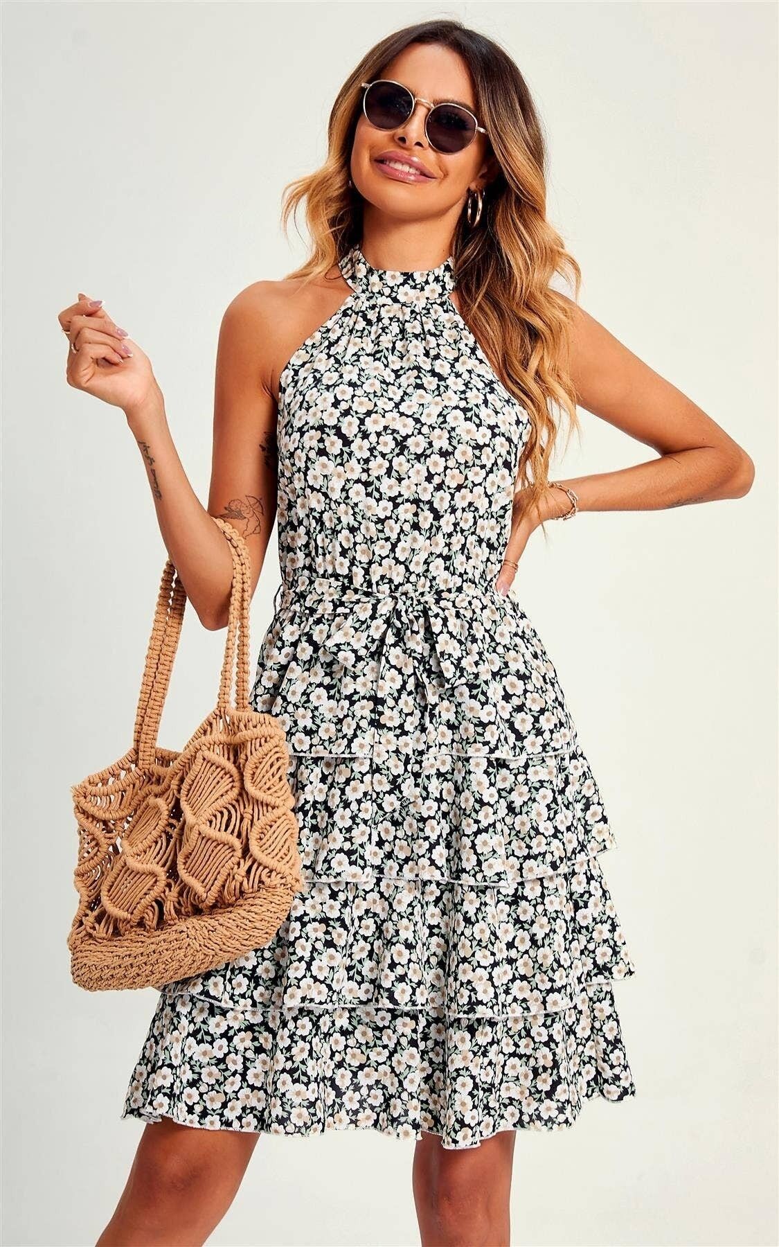 Hochgeschlossenes, schulterfreies Minikleid mit Rüschen und schwarzem Blumendruck am Rücken