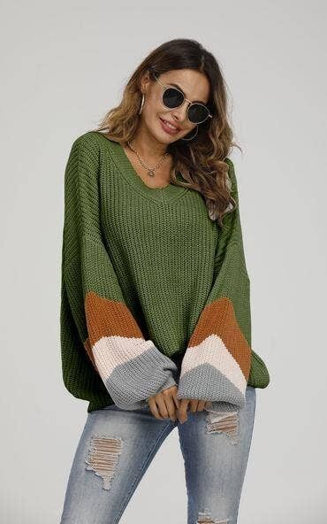 Maglia a righe in verde oliva e rosa pesca e cammello