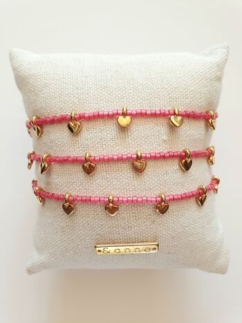 bracelet - perles coeur rose fuchsia 1