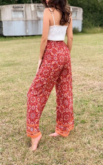 Pantalon large avec taille élastique et poches à motif floral orange 3