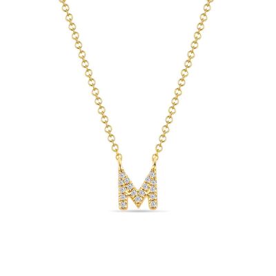 Collar letra "M", oro amarillo de 14 kt con diamantes