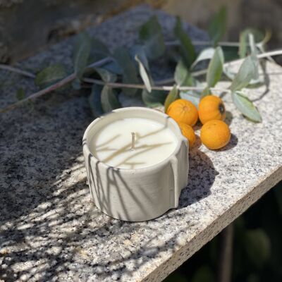 Taza de café con vela perfumada de té de mandarina