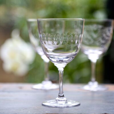 A Pair of Crystal Wine Glasses with Lens Design