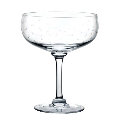 Un ensemble de quatre verres à cocktail en cristal avec motif étoiles