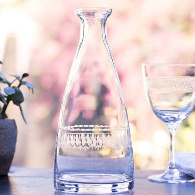 A Crystal Table Carafe with Ovals Design