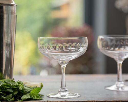 A Set of Four Crystal Cocktail Glasses with Lens Design