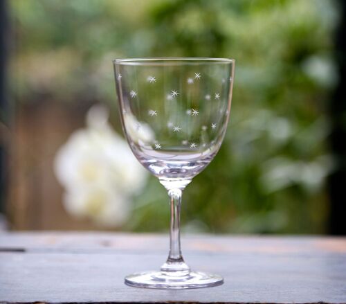 A Set Of Six Crystal Wine Glasses with Stars Design