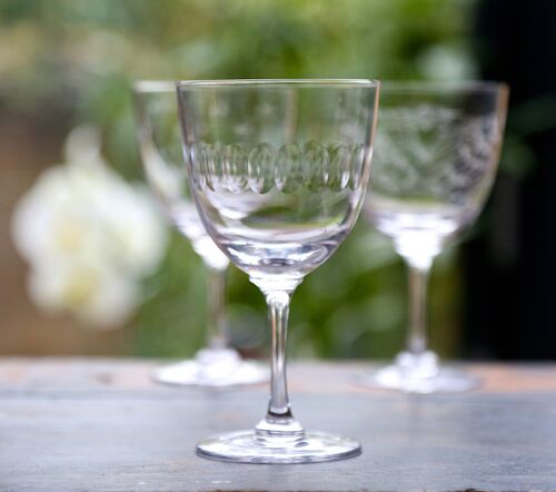 A Set Of Six Crystal Wine Glasses with Lens Design