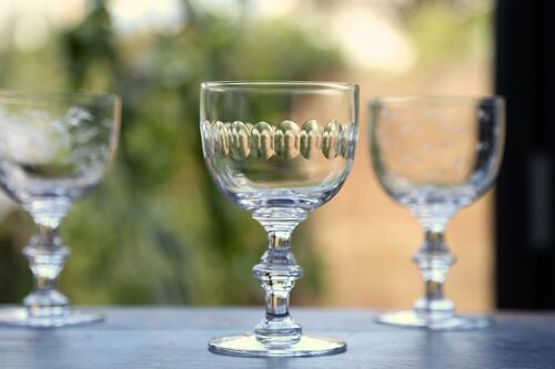 A Set Of Four Crystal Wine Goblets with Lens Design