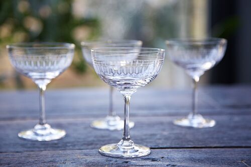 A Set of Six Crystal Champagne Saucers with Ovals Design