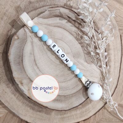 Blue and white pacifier clip