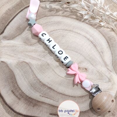Pink bow pacifier clip