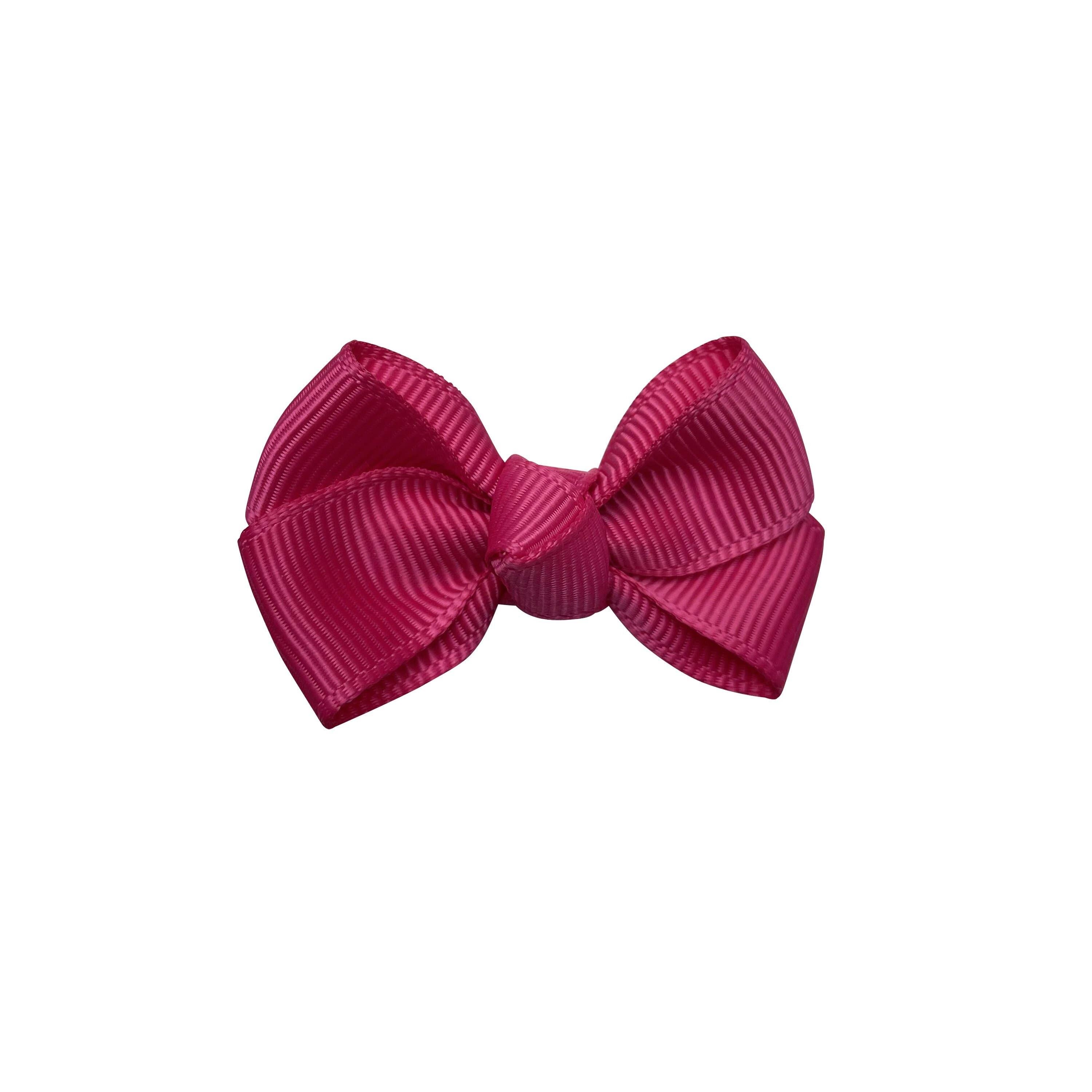 Fiocco per capelli Estelle con clip in fucsia