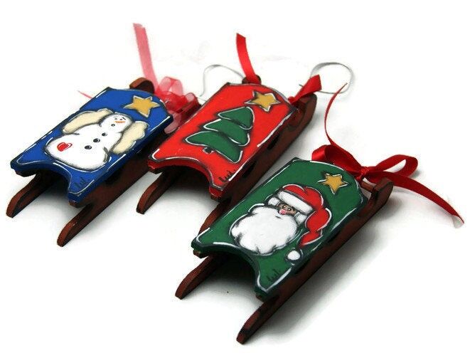 Three Christmas sledges for hanging in the Christmas tree