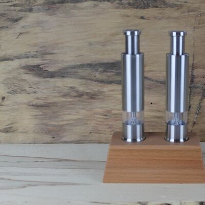 2 single-hand mills in a wooden stand