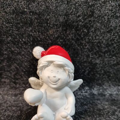 Angelo con cappello da Babbo Natale seduto 4,5 cm n. 1