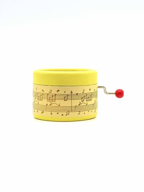 Hand Cranked music box decorated with music sheet Yellow
