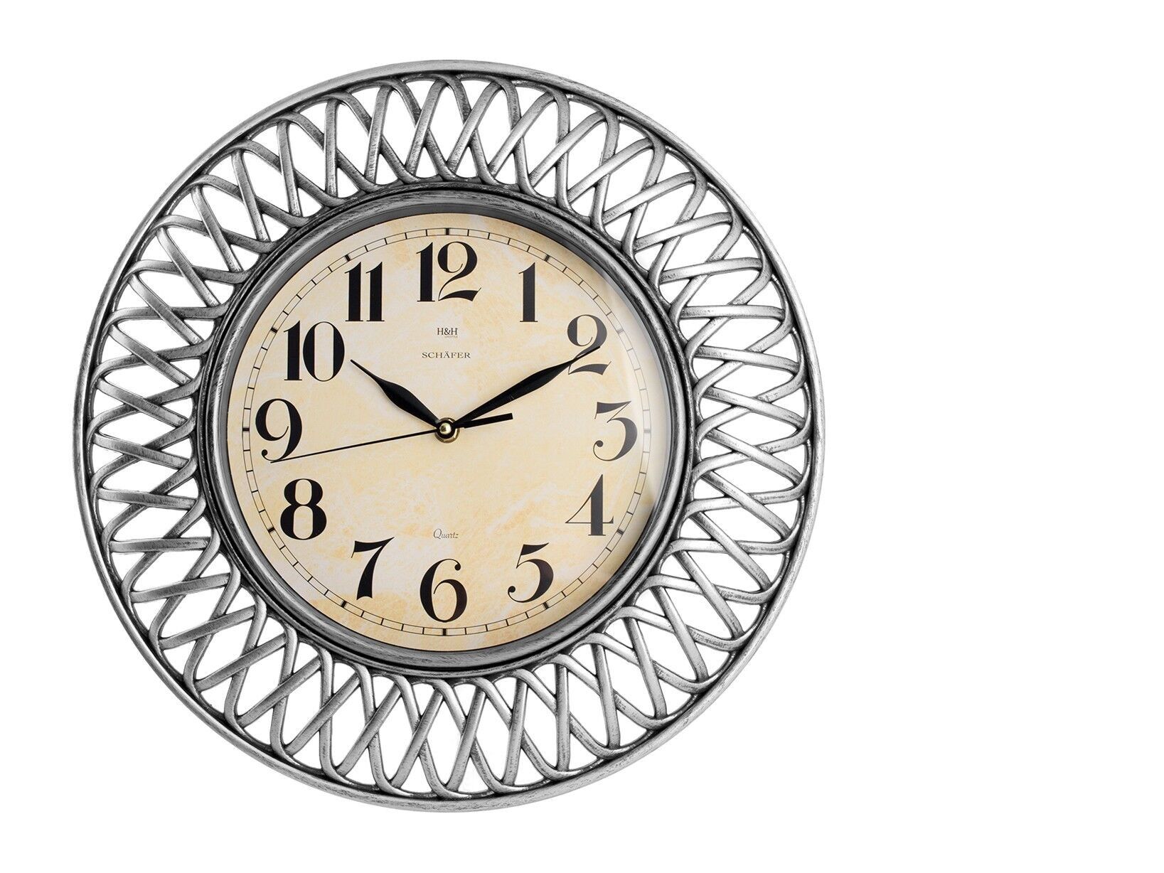 Orologio parete Shafer tondo cm 40 colore argento. Orologio con meccanismo al quarzo, batteria AA non inclusa.