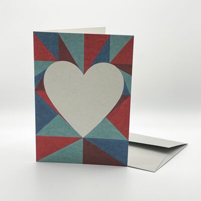 Lovely folding card.   Heart in triangles.