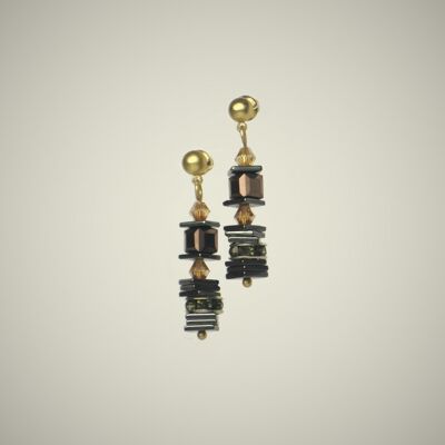 Fashionable earrings in gold, black and brown