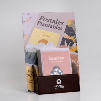 Expositor de postales plantables con sobre de papel vegetal.