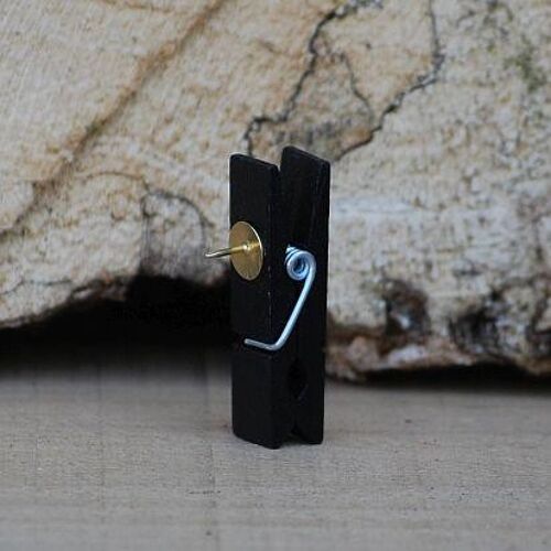 Black clothespins with pushpin