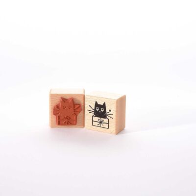 Título del sello con motivo: gato con paquete