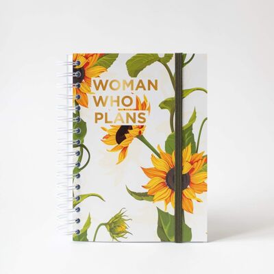 Frau, die plant - Sonnenblume