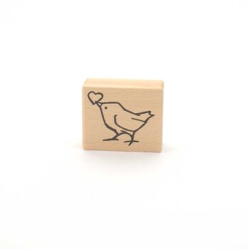 Titre du timbre motif : Un oiseau avec un cœur 3