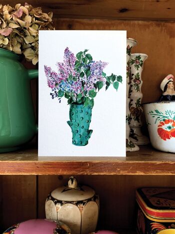 Carte Lilas dans un vase de cactus