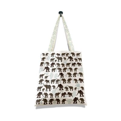 Petits éléphants sur sac blanc