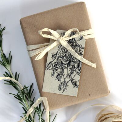 Gift tags made from grass paper, mistletoe