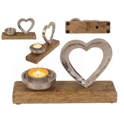 Metal tealight holder with a heart on it