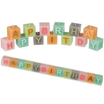 Pastel colored candle block with writing,