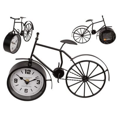 Bicicleta de metal negro con reloj,