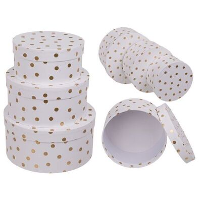 White round gift boxes with golden ones