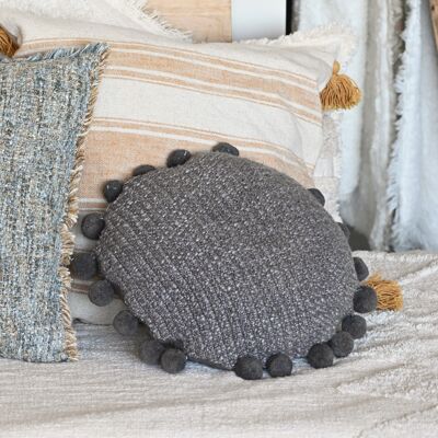 Round cushion with charcoal spun cotton pompoms