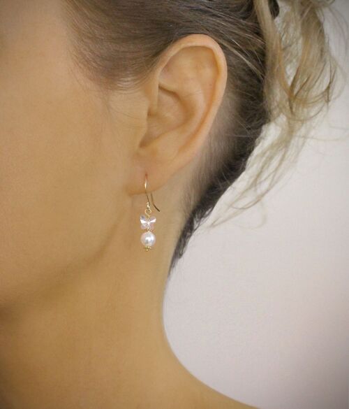 White pearl earrings with butterflies
