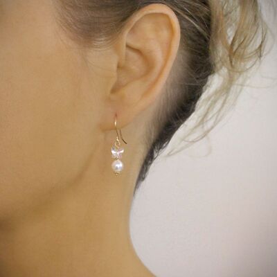 White pearl earrings with butterflies