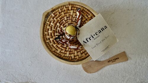Unrefined Shea Butter from Ghana in calabash with cane cover
