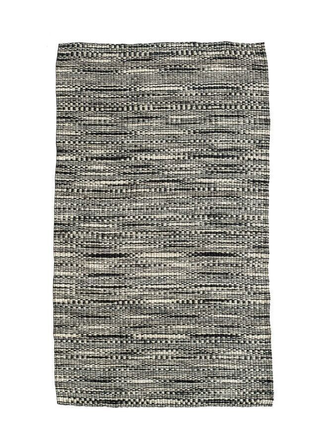 SAKAFU: Schwarz-weiß gewebter Sisalteppich