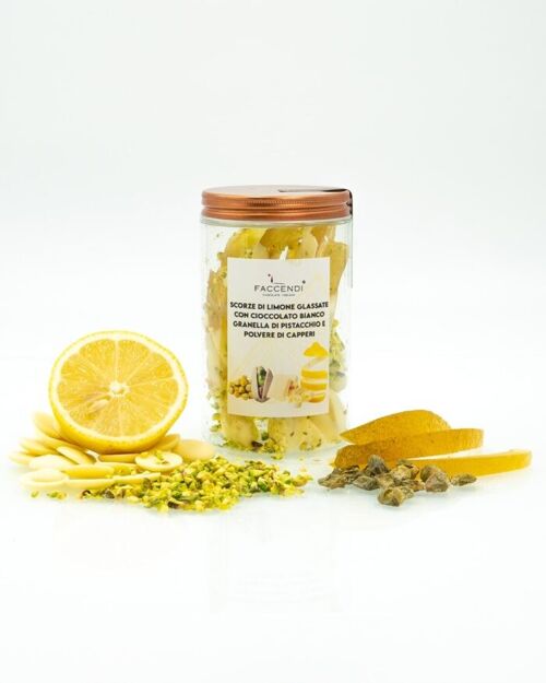 Scorzette di limone glassate al cioccolato bianco con granella di pistacchio e polvere di capperi  150 gr