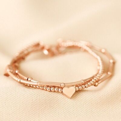 Bracelet triple épaisseur perlé cœur en or rose
