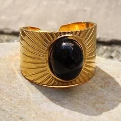 Wide adjustable ring, sun lines, stone in the center