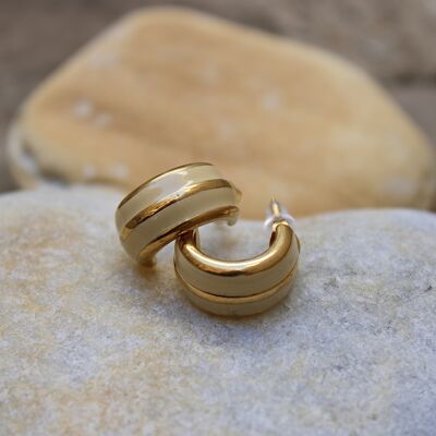Half-circle golden steel earrings with two vertical beige bands