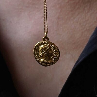 Gold steel necklace engraved profile face medallion