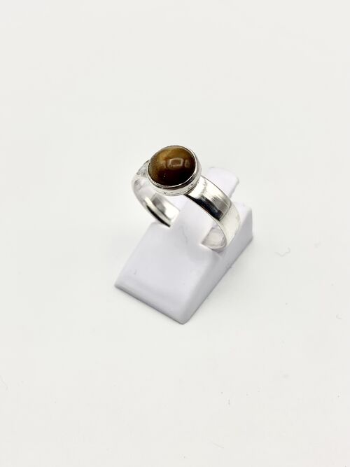 A silver ring with a 8mm Tigereye